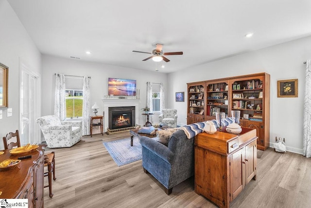 18 Yakama Way, Greenville, SC 29607 - living room featuring ceiling fan, light wood-style floors, a glass covered fireplace, and recessed lighting