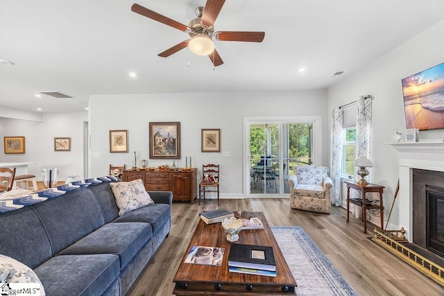 18 Yakama Way, Greenville, SC 29607 - living area with ceiling fan, a glass covered fireplace, recessed lighting, and wood finished floors