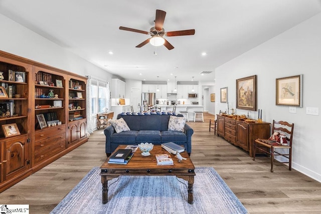18 Yakama Way, Greenville, SC 29607 - living area with ceiling fan, light wood-style floors, and recessed lighting