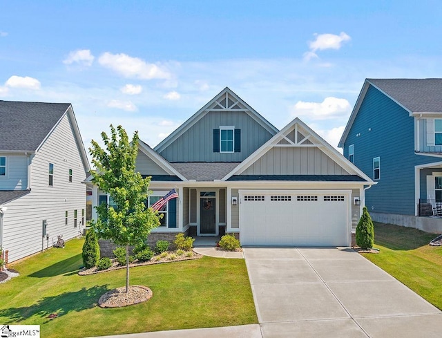 18 Yakama Way, Greenville, SC 29607 - craftsman-style house with board and batten siding, an attached garage, concrete driveway, and a front yard