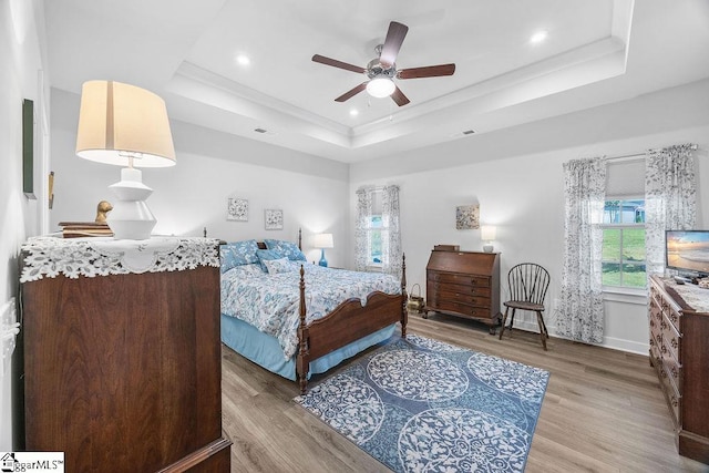 18 Yakama Way, Greenville, SC 29607 - bedroom featuring a tray ceiling, light wood finished floors, a ceiling fan, and recessed lighting