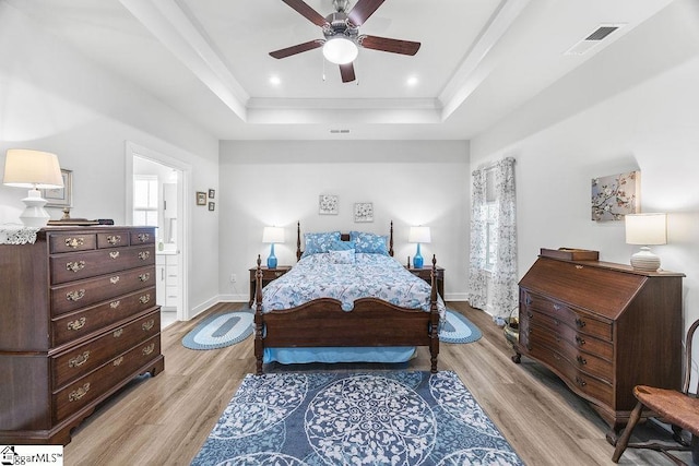 18 Yakama Way, Greenville, SC 29607 - bedroom with a tray ceiling, light wood-type flooring, ornamental molding, and a ceiling fan