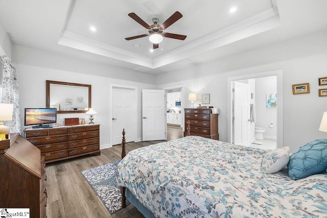 18 Yakama Way, Greenville, SC 29607 - bedroom featuring a tray ceiling, wood finished floors, ensuite bath, a ceiling fan, and recessed lighting