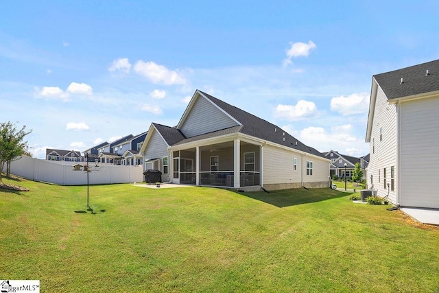 18 Yakama Way, Greenville, SC 29607 - back of house featuring a sunroom and a fenced backyard