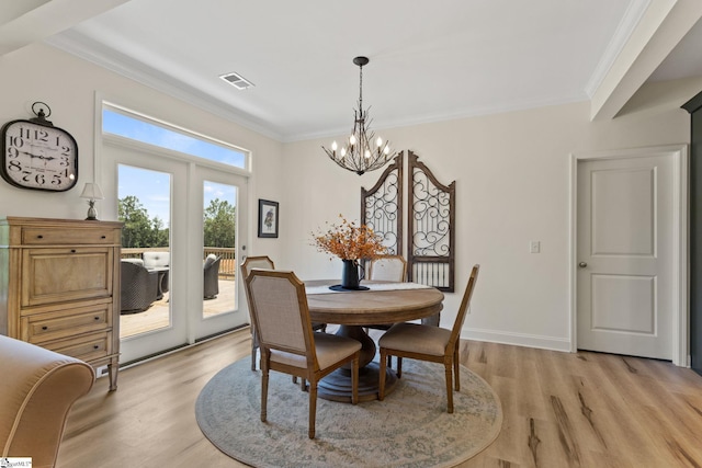 240 Nicole Marie Ct, Greer, SC 29651 - dining room featuring a chandelier, light wood-style floors, crown molding, and french doors