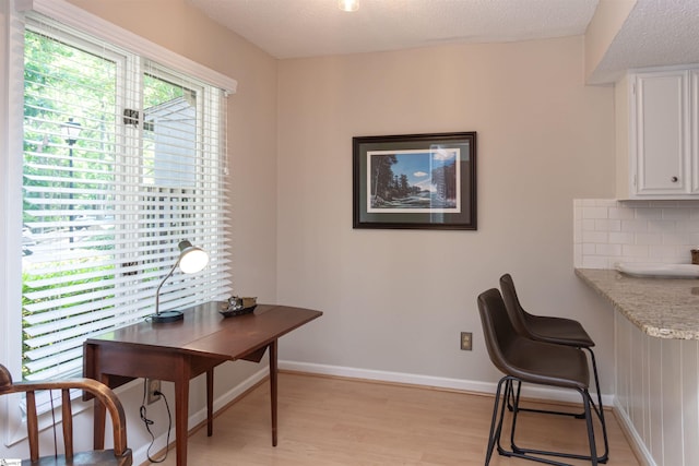 130 Inglewood Way, Greenville, SC 29615 - home office with light wood-style flooring and a textured ceiling