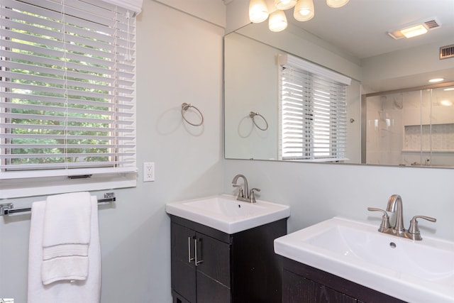 130 Inglewood Way, Greenville, SC 29615 - full bath with healthy amount of natural light, a stall shower, and two vanities