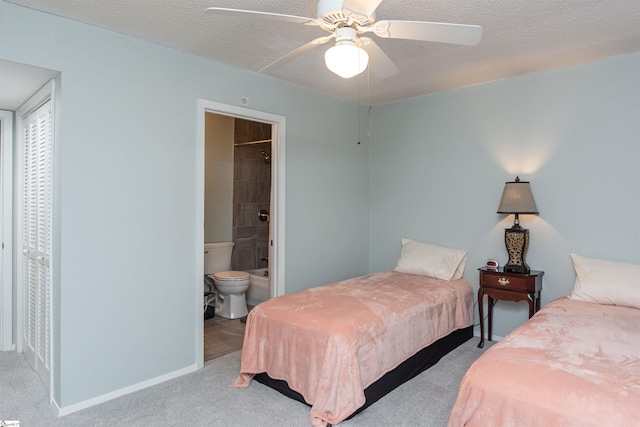 130 Inglewood Way, Greenville, SC 29615 - carpeted bedroom with connected bathroom, a textured ceiling, and a ceiling fan