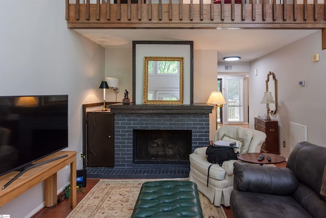 130 Inglewood Way, Greenville, SC 29615 - living area with wood finished floors and a fireplace