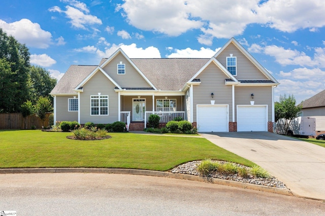 6 Nakkol Dr, Simpsonville, SC 29680 - view of front of house featuring driveway, an attached garage, covered porch, and roof with shingles