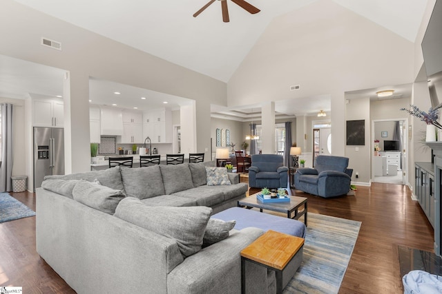 6 Nakkol Dr, Simpsonville, SC 29680 - living room featuring a ceiling fan, high vaulted ceiling, dark wood-style floors, and a fireplace
