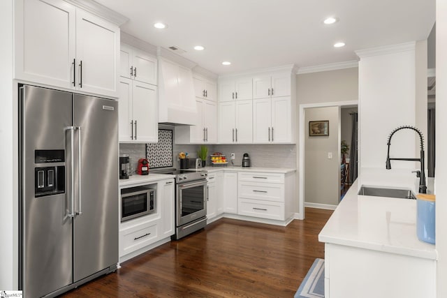 6 Nakkol Dr, Simpsonville, SC 29680 - kitchen with stainless steel appliances, custom exhaust hood, tasteful backsplash, crown molding, and recessed lighting