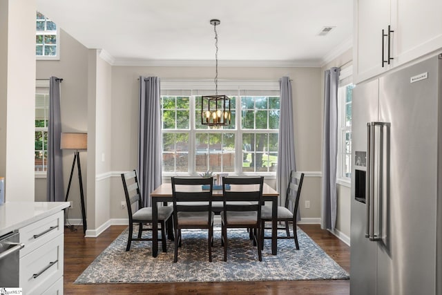 6 Nakkol Dr, Simpsonville, SC 29680 - dining space with dark wood finished floors, a chandelier, plenty of natural light, and ornamental molding