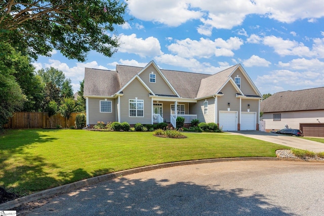 6 Nakkol Dr, Simpsonville, SC 29680 - traditional-style house featuring a porch, concrete driveway, an attached garage, and a shingled roof