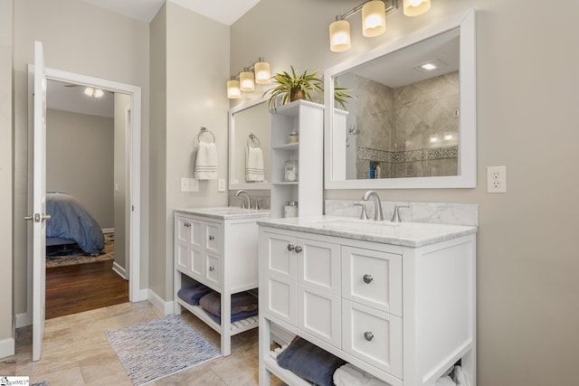 6 Nakkol Dr, Simpsonville, SC 29680 - full bathroom featuring two vanities, connected bathroom, and tiled shower