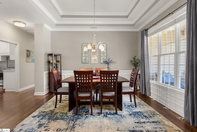 6 Nakkol Dr, Simpsonville, SC 29680 - dining room with a tray ceiling, plenty of natural light, wood finished floors, a chandelier, and crown molding