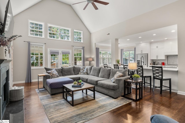 6 Nakkol Dr, Simpsonville, SC 29680 - living area featuring ceiling fan, a fireplace with flush hearth, dark wood-style flooring, recessed lighting, and high vaulted ceiling