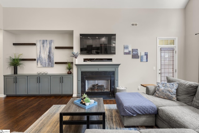 6 Nakkol Dr, Simpsonville, SC 29680 - living room with dark wood-style floors and a glass covered fireplace