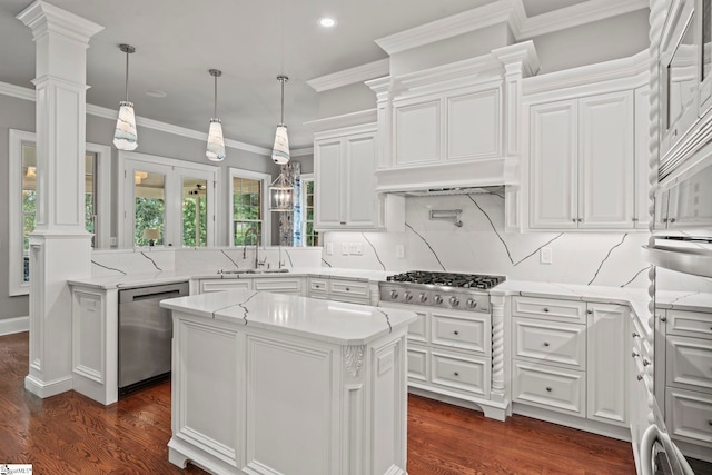19 Hobcaw Dr, Greer, SC 29650 - kitchen featuring stainless steel appliances, white cabinets, decorative columns, backsplash, and recessed lighting