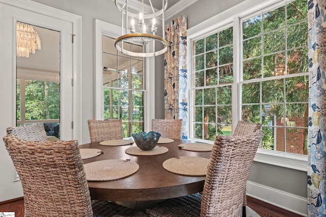 19 Hobcaw Dr, Greer, SC 29650 - dining space featuring a chandelier, plenty of natural light, ornamental molding, and wood finished floors