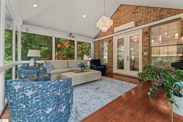 19 Hobcaw Dr, Greer, SC 29650 - sunroom with french doors, a wall unit AC, an outdoor hangout area, wood finished floors, and high vaulted ceiling