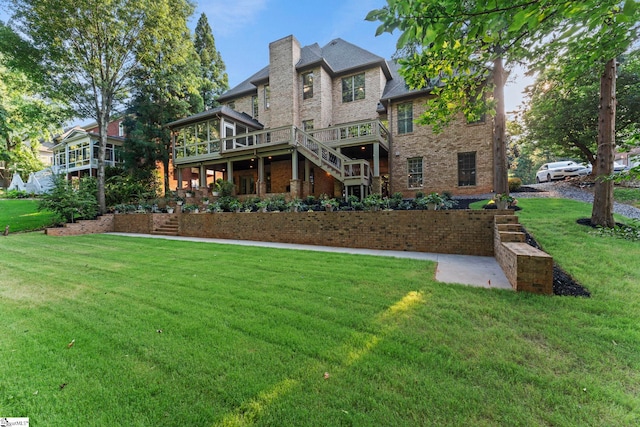 19 Hobcaw Dr, Greer, SC 29650 - back of property with stairs, brick siding, a yard, and a wooden deck