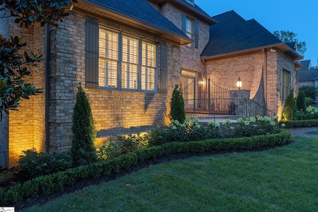 19 Hobcaw Dr, Greer, SC 29650 - view of front facade with brick siding, a front yard, and roof with shingles