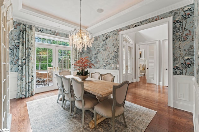 19 Hobcaw Dr, Greer, SC 29650 - dining space with french doors, wallpapered walls, wainscoting, a chandelier, and wood finished floors