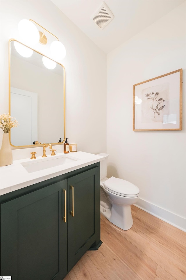 5 Martin Row, Greenville, SC 29601 - half bathroom with wood finished floors and vanity