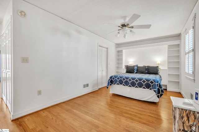 19 E Circle Ave, Greenville, SC 29607 - bedroom with light wood-type flooring and ceiling fan