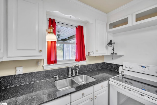 19 E Circle Ave, Greenville, SC 29607 - kitchen with electric range, white cabinets, ornamental molding, and dark stone countertops