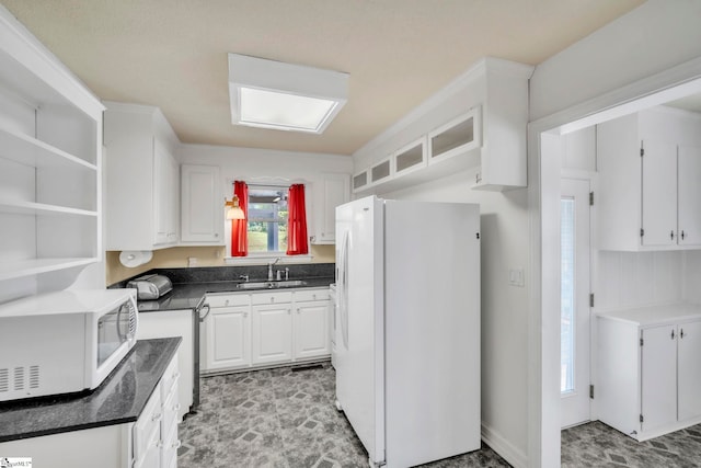 19 E Circle Ave, Greenville, SC 29607 - kitchen featuring white appliances, white cabinets, and dark countertops