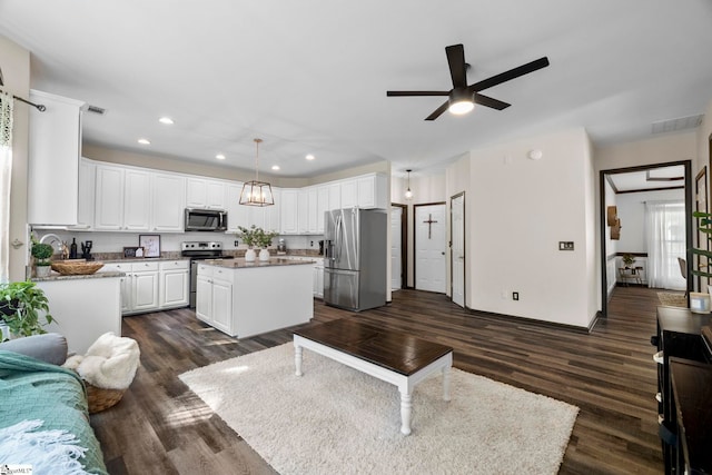 409 Summergreen Way, Greenville, SC 29607 - living area with ceiling fan, dark wood-style flooring, and recessed lighting