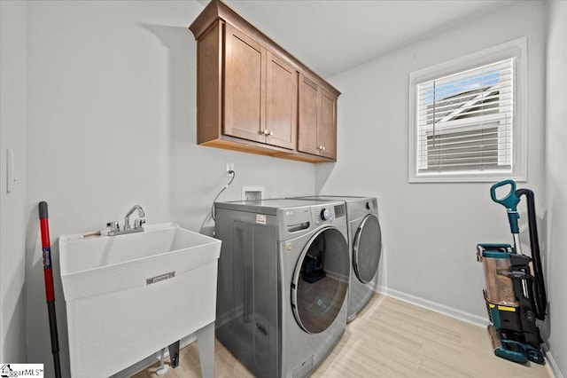 229 Layken Ln, Woodruff, SC 29388 - laundry area featuring independent washer and dryer and cabinet space