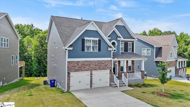 229 Layken Ln, Woodruff, SC 29388 - craftsman inspired home with covered porch, a garage, stone siding, concrete driveway, and a front lawn