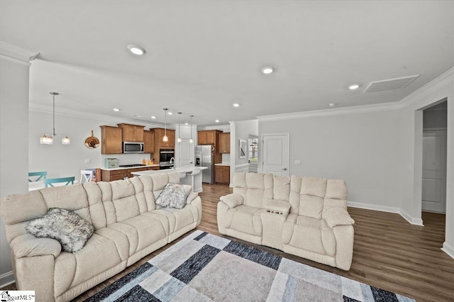 229 Layken Ln, Woodruff, SC 29388 - living room featuring crown molding, wood finished floors, and recessed lighting