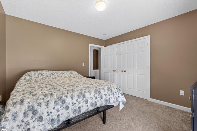111 Falcon Ln, Chesnee, SC 29323 - carpeted bedroom featuring a closet and baseboards