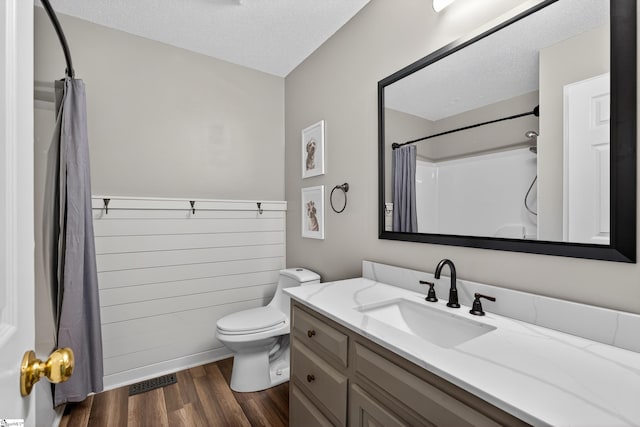 111 Falcon Ln, Chesnee, SC 29323 - bathroom featuring a textured ceiling, wood finished floors, vanity, and curtained shower