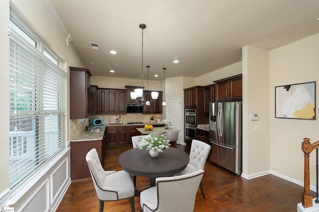 330 Mansfield Ln, Greer, SC 29650 - dining area with dark wood-style floors, a chandelier, and recessed lighting