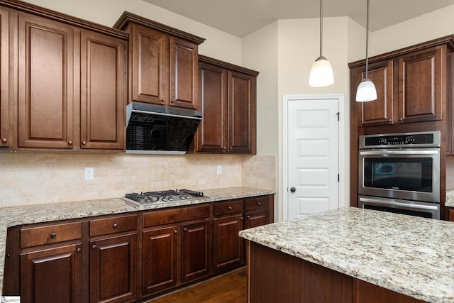 330 Mansfield Ln, Greer, SC 29650 - kitchen with appliances with stainless steel finishes, ventilation hood, backsplash, and light stone counters