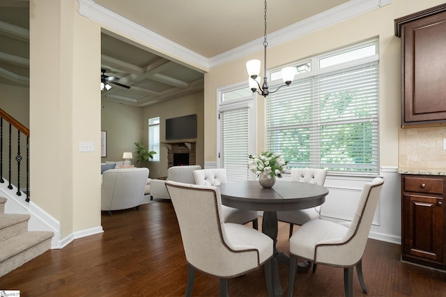 330 Mansfield Ln, Greer, SC 29650 - dining area with stairs, coffered ceiling, a chandelier, a fireplace, and beam ceiling