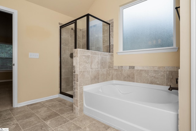 330 Mansfield Ln, Greer, SC 29650 - bathroom featuring a garden tub, a stall shower, and tile patterned flooring