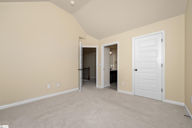 330 Mansfield Ln, Greer, SC 29650 - unfurnished bedroom featuring lofted ceiling, light colored carpet, and ensuite bathroom