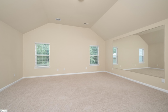 330 Mansfield Ln, Greer, SC 29650 - spare room featuring lofted ceiling and light colored carpet
