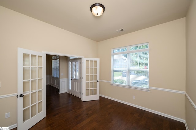 330 Mansfield Ln, Greer, SC 29650 - spare room featuring french doors and wood finished floors