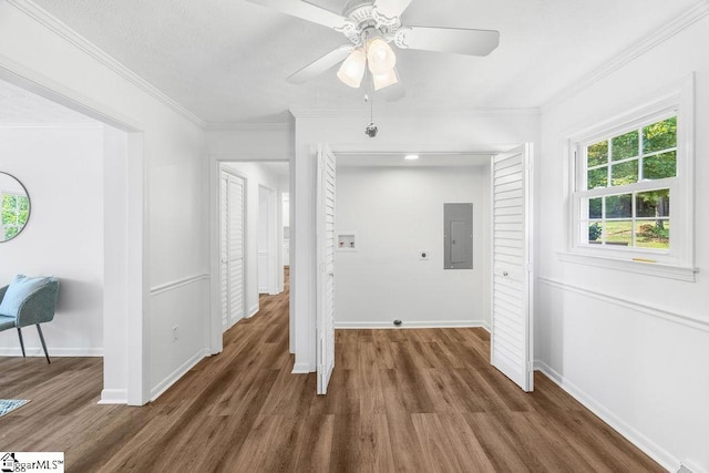 1117 Briarwood Dr, Easley, SC 29642 - unfurnished room featuring electric panel, a ceiling fan, wood finished floors, and crown molding