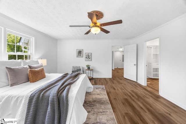 1117 Briarwood Dr, Easley, SC 29642 - bedroom with wood finished floors, a textured ceiling, ornamental molding, and a ceiling fan
