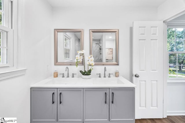 1117 Briarwood Dr, Easley, SC 29642 - full bath with double vanity, a shower, and wood finished floors