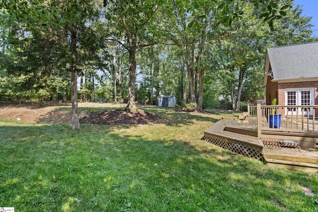 108 Goldenstar Ln, Greer, SC 29651 - view of grassy yard with a storage shed and a deck