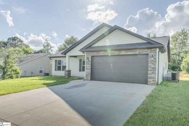 121 Stanmoore Dr, Anderson, SC 29621 - single story home featuring stone siding, concrete driveway, a garage, and a front lawn